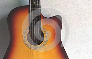A guitar of sunburst tone on white isolated background ,space for text