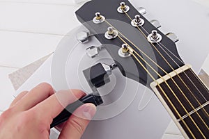 Guitar three-in-one string changer, nail opener, thread cutter tool