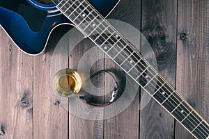 Guitar, watch and whiskey