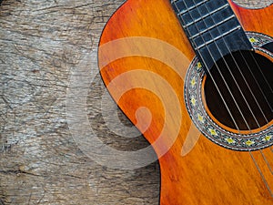 The guitar on wooden texture background. Love, Music day concept