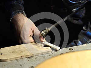 Guitars Luthiers cuts off part of Nut. photo