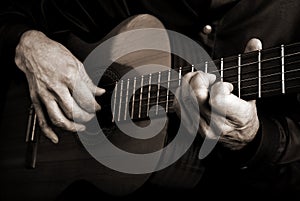 Guitarist hands and guitar