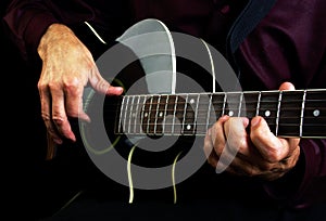 Guitarist hands and guitar