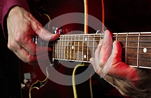 Guitarist hands and guitar