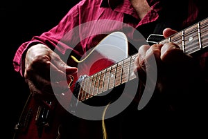 Guitarist hands and guitar close up. playing electric guitar. play the guitar.