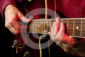 Guitarist hands and guitar close up. playing electric guitar. play the guitar.