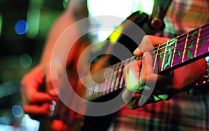 Guitarist hands playing guitar