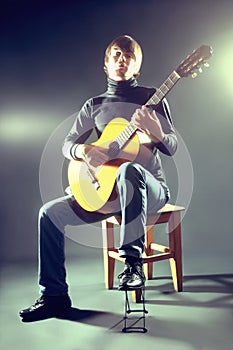 Guitarist musician guitar acoustic playing.