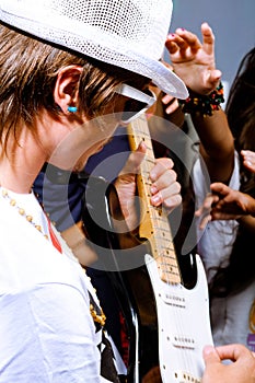 Guitarist performing for his adoring fans