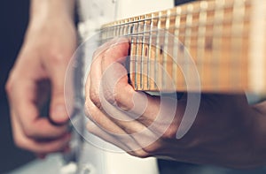 Guitarist playing an electric guitar