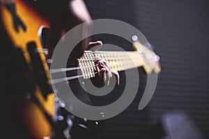 The Guitarist Playing Guitar and Singing