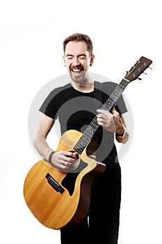 Guitarist playing and singing loudly on isolated a white background