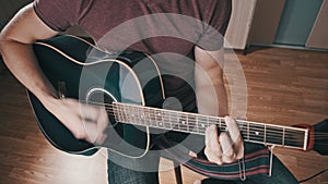 Guitarist Plays Acoustic Guitar at Home