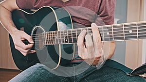 Guitarist Plays Acoustic Guitar at Home