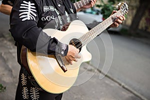 Guitarist plays the guitar.