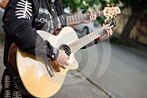 Guitarist plays the guitar.