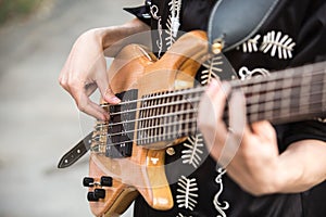 Guitarist plays the guitar.