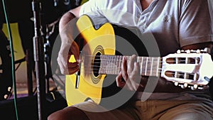 Guitarist plays the guitar in the bar