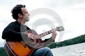 Guitarist portrait profile closeup