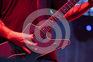 The guitarist during a solo show at a metal concert