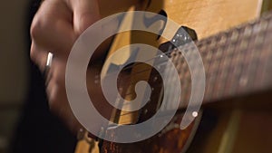 Guitarists hands close-up