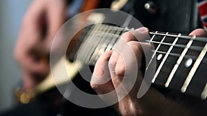 Guitarists Playing On Guitar