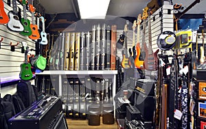 Guitars and guitar cases in store