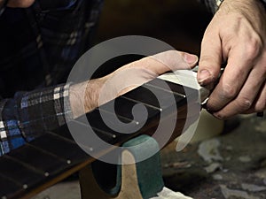 Guitars Luthiers installs Nut. photo