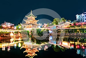 Night view of Jiaxiu Tower in Duyun, Guizhou, China photo