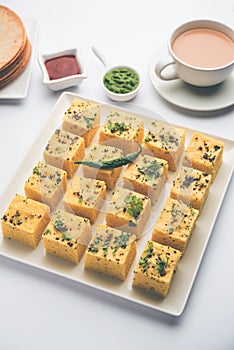 Gujarati Khaman Dhokla or Steamed Gram Flour Puffy Snack Cake