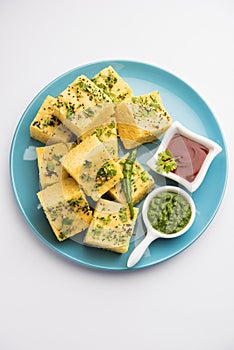 Gujarati Khaman Dhokla or Steamed Gram Flour Puffy Snack Cake