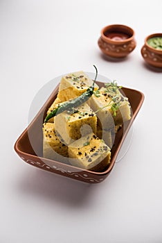 Gujarati Khaman Dhokla or Steamed Gram Flour Puffy Snack Cake