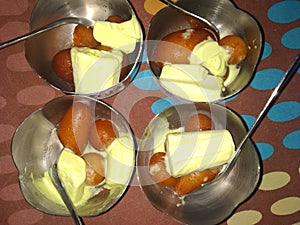 Gulab jamun with ice creame sweet indian desert ice and fire