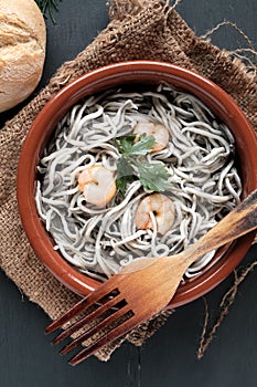 Gulas with garlic and prawns