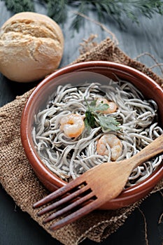 Gulas with garlic and prawns