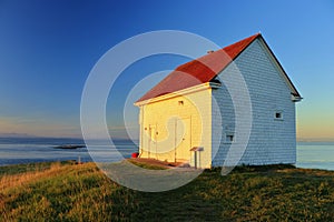 Gulf Islands National Park, Saturna Island, Last Sunrays shining on Old Foghorn Station at East Point, British Columbia, Canada