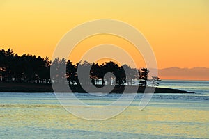 Gulf Islands National Park Sunset with Shorepine Forest on Tumbo Island from East Point, Saturna Island, British Columbia, Canada