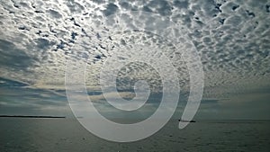 Gulf of Mexico with well boat beautiful sky and clouds