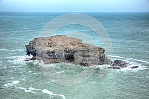 Gull Rock Portreath North Cornwall England UK between St Agnes and Godrevy in HDR