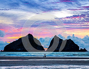 Gull rocks at sunset in Hollywell Bay in Cornwall