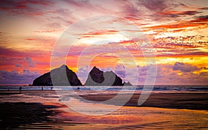 Gull rocks at sunset in Hollywell Bay in Cornwall