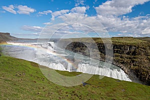 Gullfoss (Golden falls) waterfall and rainbow in Iceland.