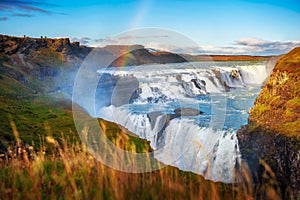 Gullfoss waterfall and the Olfusa river in southwest Iceland with a rainbow