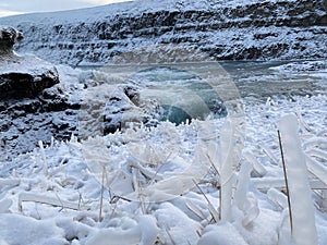 Gullfoss waterfall during winter in Iceland. Iceblue and cold.