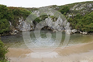 Gulpiyuri beach in Asturias, Spain.
