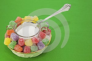 Gum drops sugar bowl spoon concept