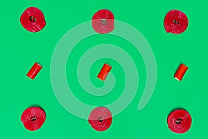 gumdrops and red spirals on green background. pattern and series. wallpaper to use text.