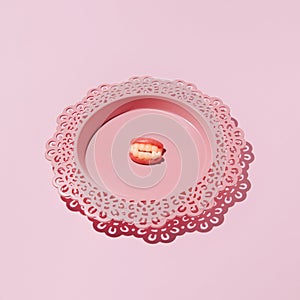 Gummy candy, teeth and gums model in a plate