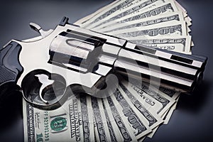 Gun on 100-bucks background