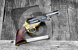 Gun and Bible.
